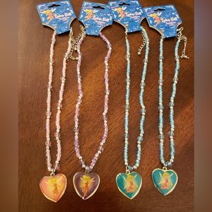 Tinker bell beads necklace with heart charms and a claps with extension.
